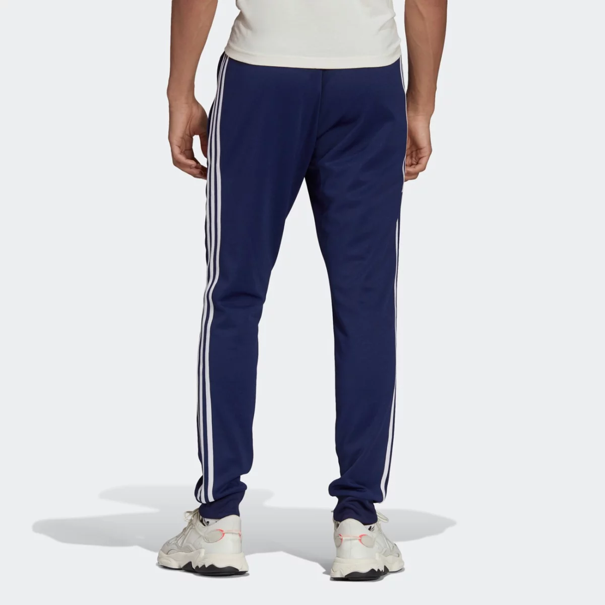 adicolor_classics_primeblue_sst_track_pants_mple_h06714_23_hover_model-huge-665762ef83bff